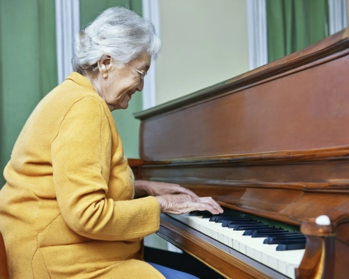Elderly Woman Playing Piano